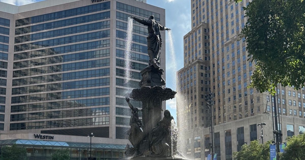 Fountain Square in downtown Cincinnati with the Tyler Davidson Fountain and surrounding office buildings.